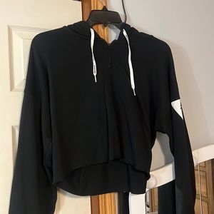 super cute Reebok black half zipped hoodie.